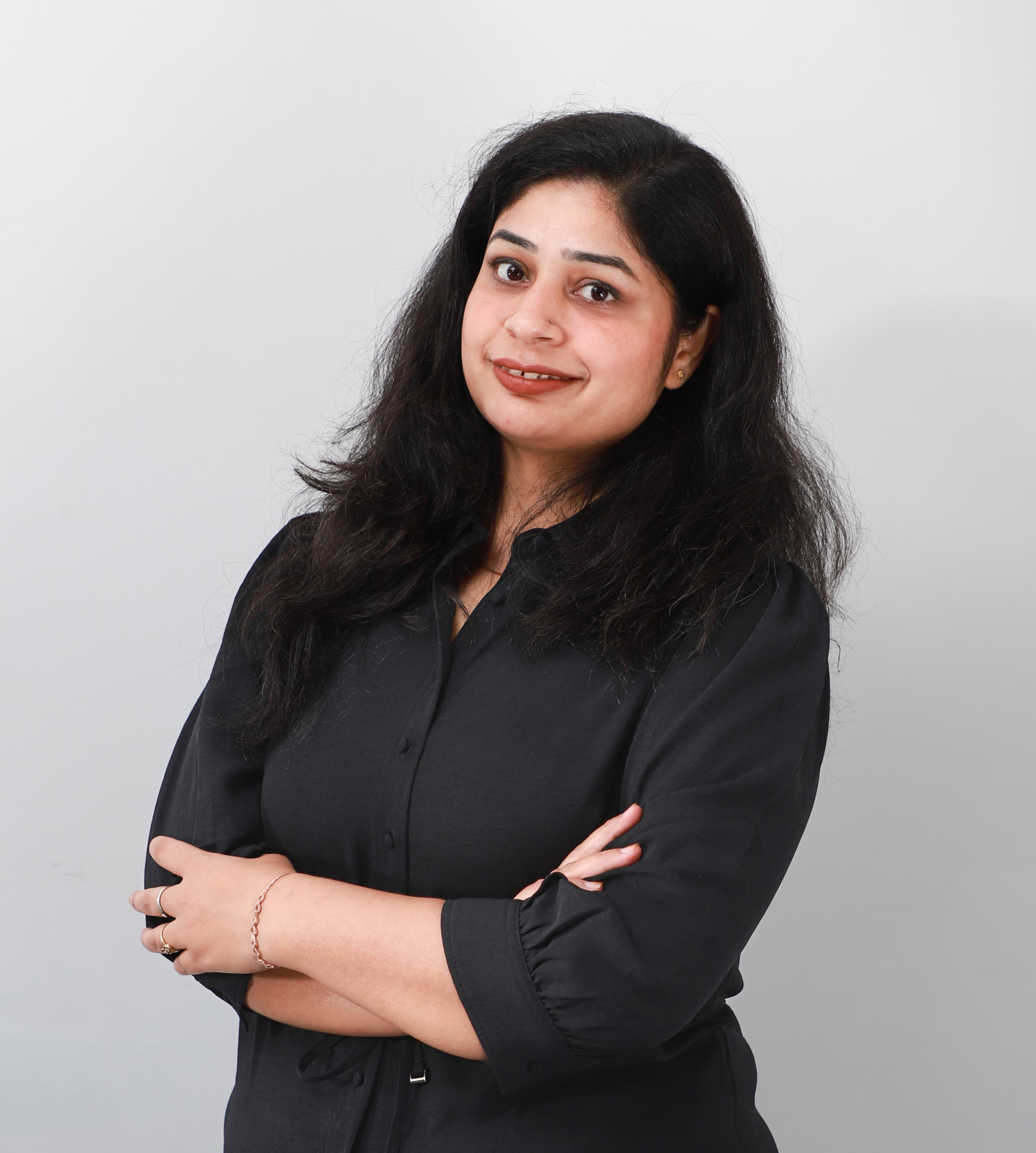 Portrait of Garima Sharma, Manager